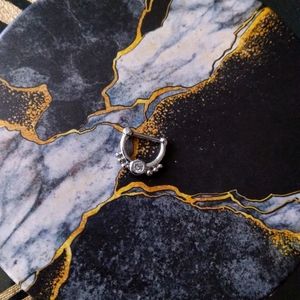 Steel clicker ring with beads and gem